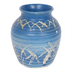 Quentin Bell 1910-1996: ribbed vase with fluted rim, decorated in white abstract design on...