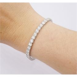 18ct white gold round brilliant cut diamond line bracelet, stamped, total diamond weight approx 7.30 carat 