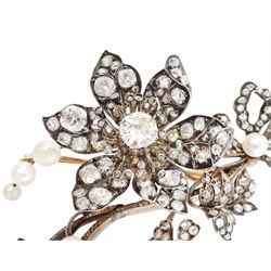 19th century gold and silver diamond and pearl en tremblant detachable brooch, the flower tremblant with a principal old cut diamond of approx 1.90 carat, the petals and stamen set with old cut and rose cut diamonds, total diamond weight approx 9.10 carat, to a foliate spray set set with further rose cut diamond and white / pink / cream pearls and ribbon tie