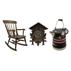 19th century child's rocking chair; heavily carved cuckoo clock; canal buckby can hand painted with floral motifs (3)