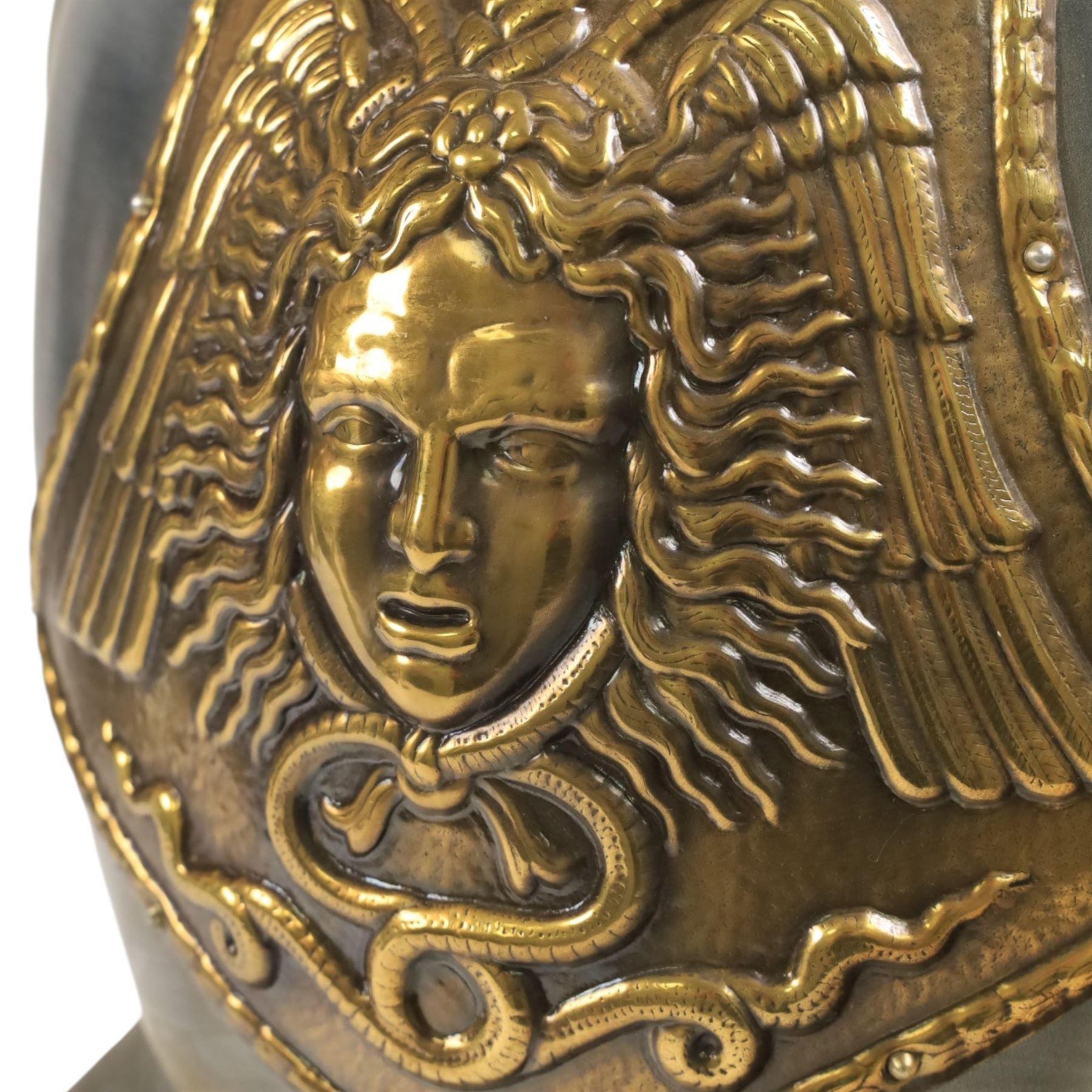 Two reproduction breast plates, including on example with Medusa to the front, H42cm