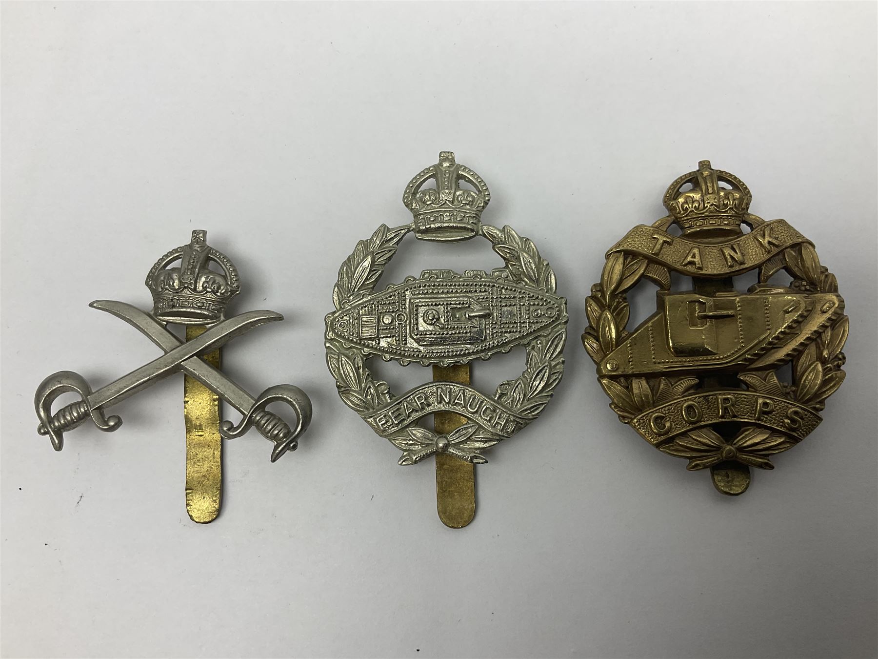 Twenty-seven military metal cap badges including Royal tank Corps, Reconnaissance Corps, Royal Armoured Corps, Royal Corps of Signals, Womens Army Auxiliary Corps, Queen Mary's Army Auxiliary Corps, Auxiliary Territorial Service,  Royal Engineers, REME, Army physical Training Corps etc 