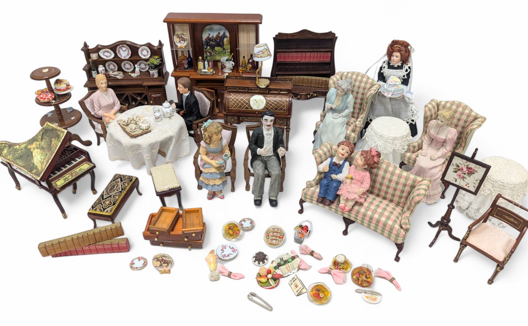 Dolls house drawing room furniture, including dressers, pink and green checked sofa and armchairs, bureau, chairs, piano, eight figures and a collection of afternoon tea miniatures