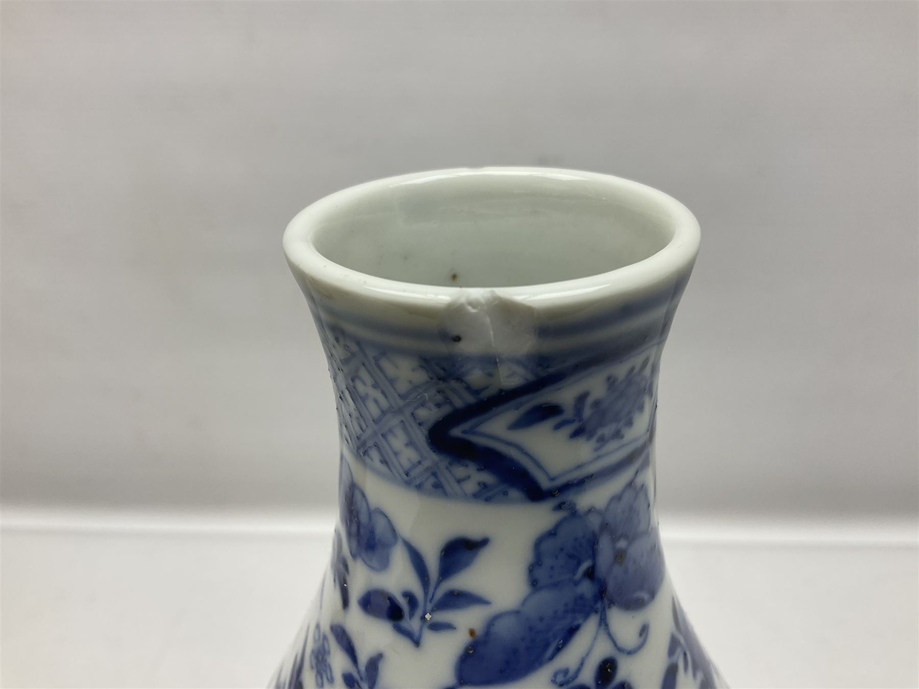 19th century Chinese blue and white double gourd form vase, decorated with blooming peonies and birds in flight, H36cm