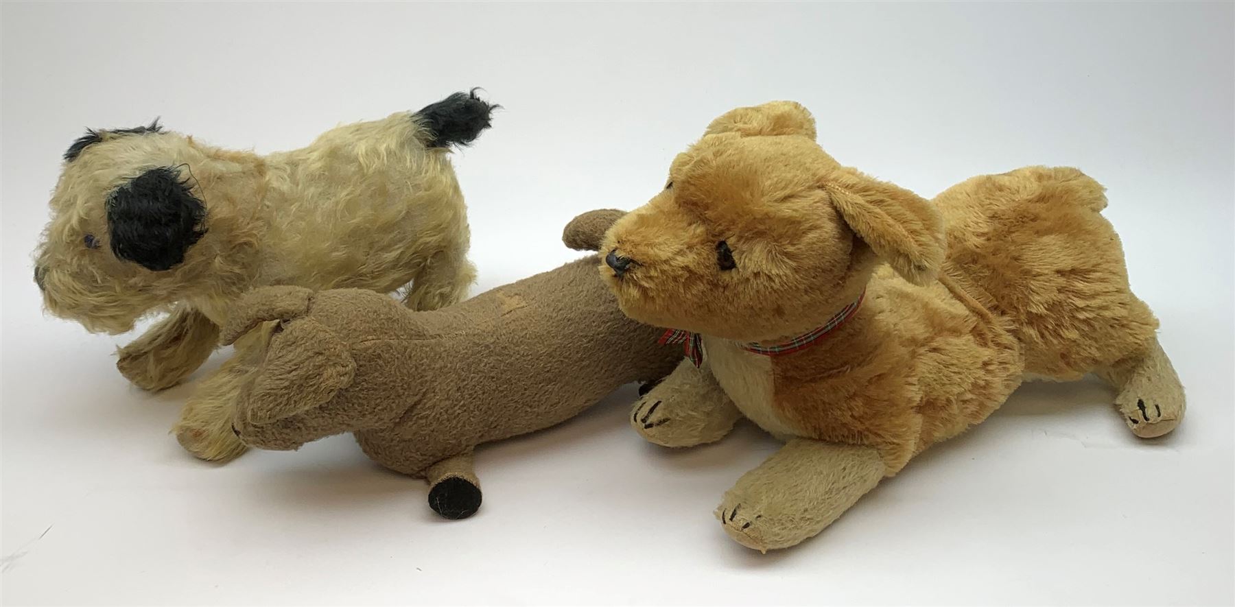 Three English dogs 1930s-60s including Deans Rag Book Co. Ltd. 'Childsplay' corgi in crouching position with two-tone body, glass type eyes and plastic nose with stitched mouth L18