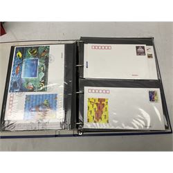 Mostly Chinese stamps including  covers and postcards, many being from the 80s and 90s, housed in ten folders