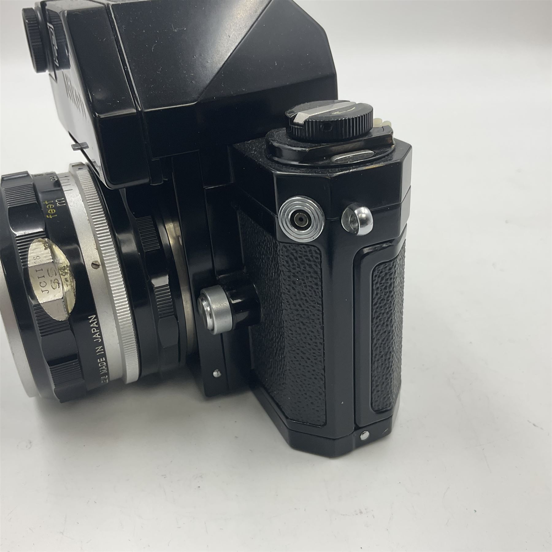 Nikon F Photomic camera body, serial no. 6543350, circa 1964, with 'Nikon NIKKOR-H Auto 1:2 f=50mm' lens, serial no. 1002112