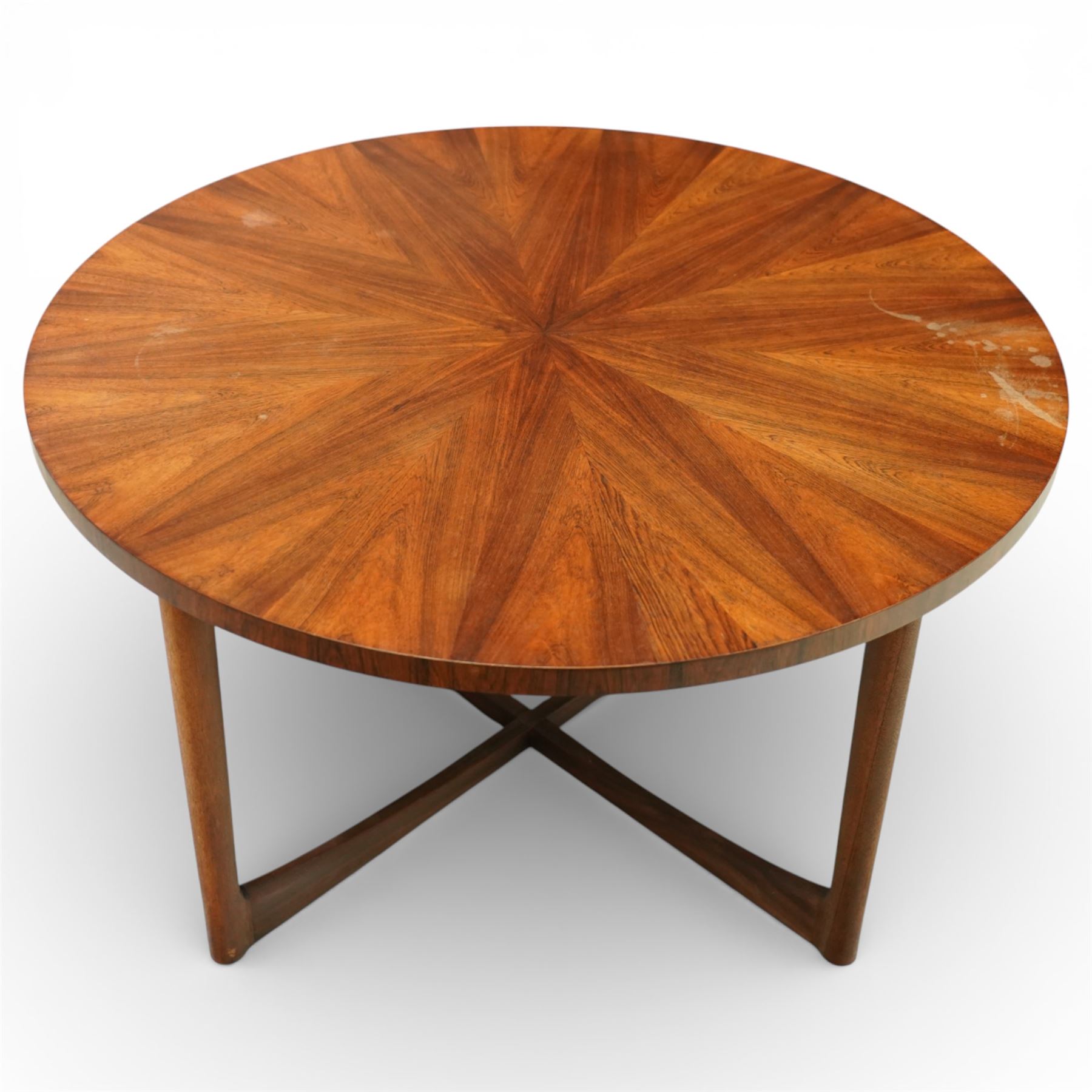 McIntosh of Kirkcaldy - Mid 20th century circular teak coffee table, circular top with book-matched radial veneers forming a starburst pattern and plain edge, raised on four tapered supports united by a shaped stretcher frame