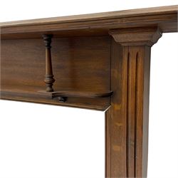 Early 20th century oak fire surround, moulded mantle piece over shelf with turned supports, shaped and fluted uprights 