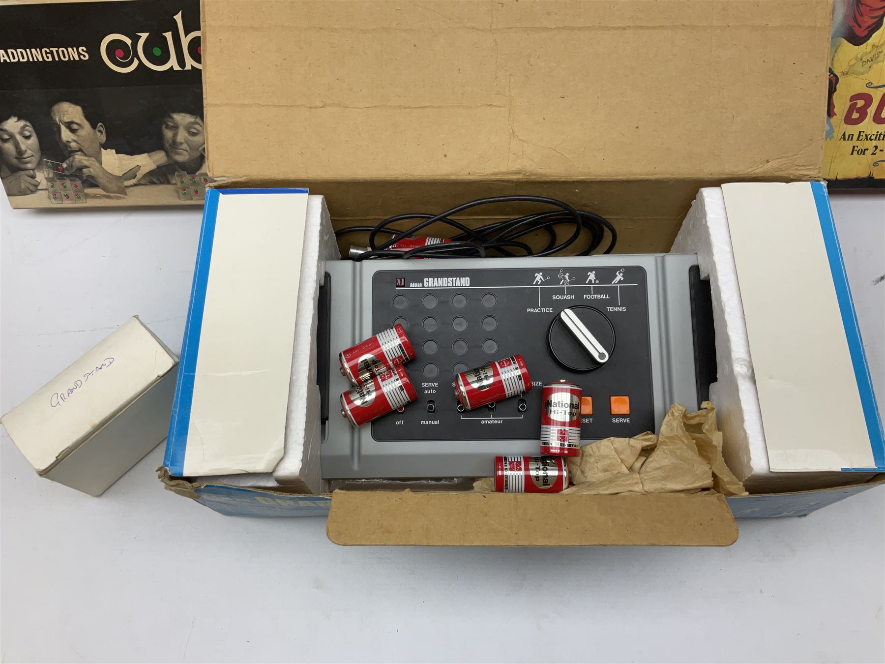 Meccano - Set No.5 with instruction booklets and Set 1+1X Conversion Set; both boxed; Adman Grandstand TV Game; boxed; Parker Colditz Board Game; and four Waddingtons Board Games including Cube Fusion, Totopoly, Golf Winks and Buccaneer; all boxed (8)