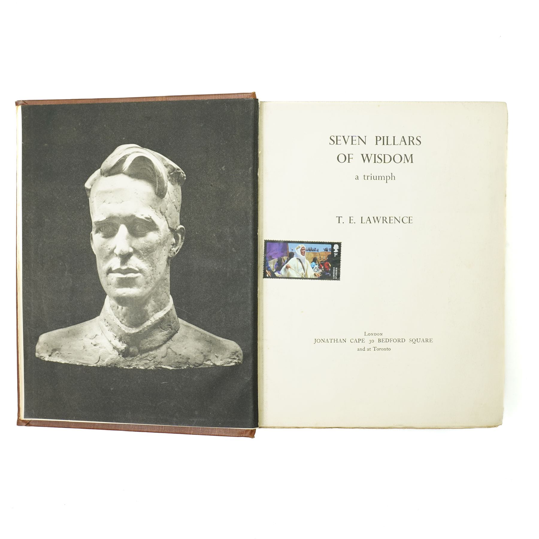  Lawrence, T. E. - 'Seven Pillars of Wisdom: a triumph'. London: Jonathan Cape, 1935. First trade edition with fold-out maps, original brown cloth with gilt lettering