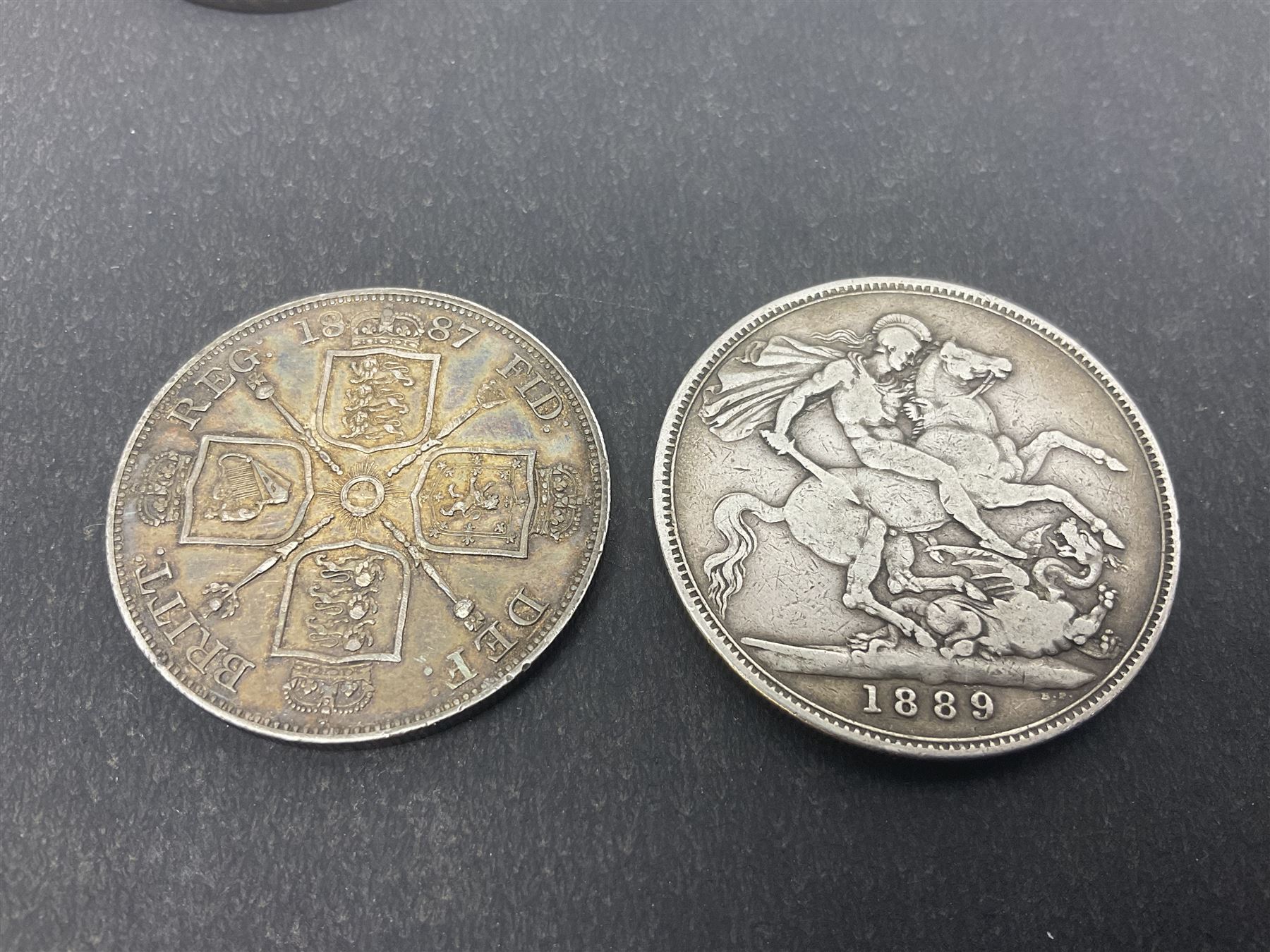 Queen Victoria 1889 silver crown coin, two double florins dated 1887, 1890 and a George III crown with illegible date (4)