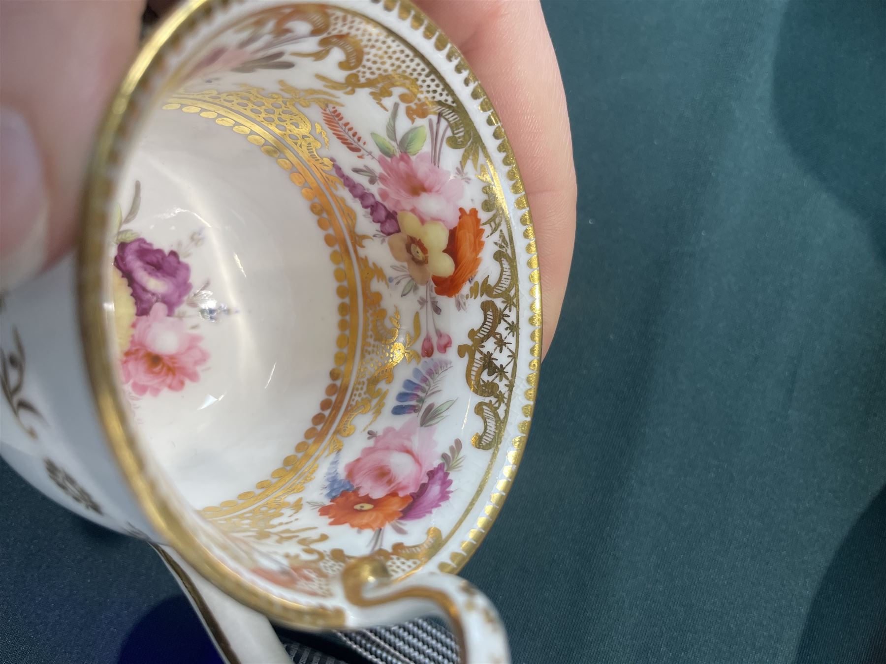 Coalport tea and coffee cups, pattern no. 830, decorated with sprays of flowers within gilt borders, comprising three teacups, four coffee cups and five saucers, with another matched teacup and saucer 