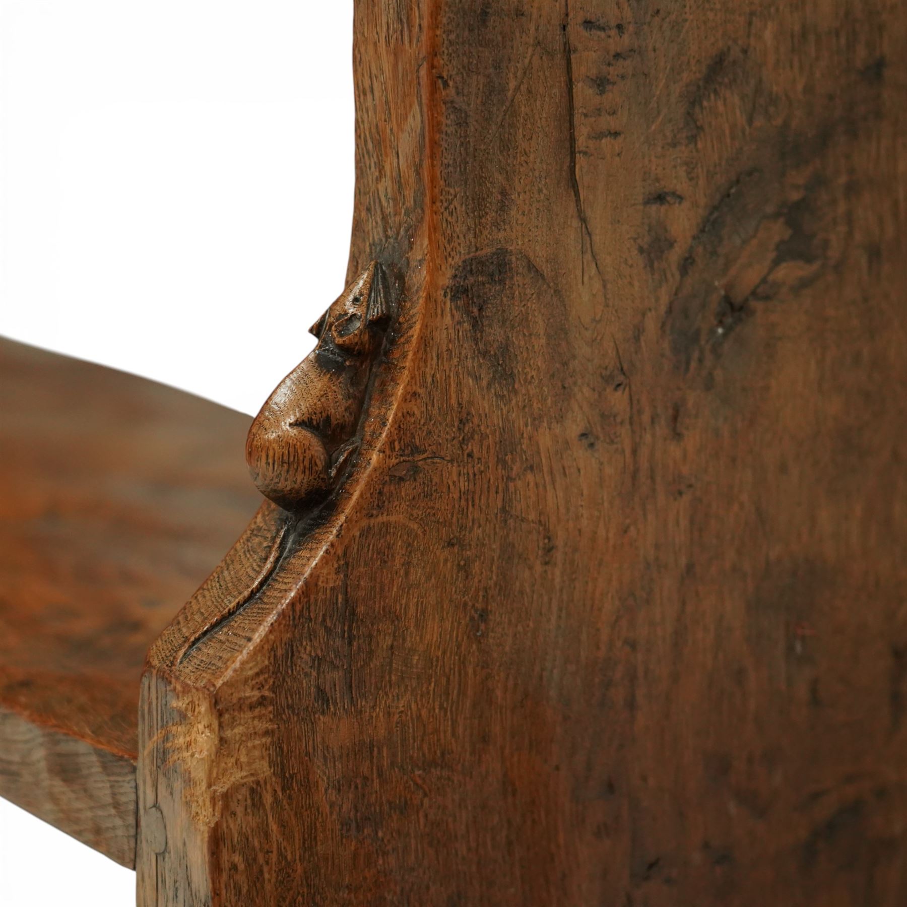 Mouseman - circa 1920s/1930s oak open back 3ft bookcase, the adzed top with scalloped detail, dual depth adzed ends, with two adjustable shelves over two fixed shelves, with carved fat mouse signature, by Robert Thompson of Kilburn