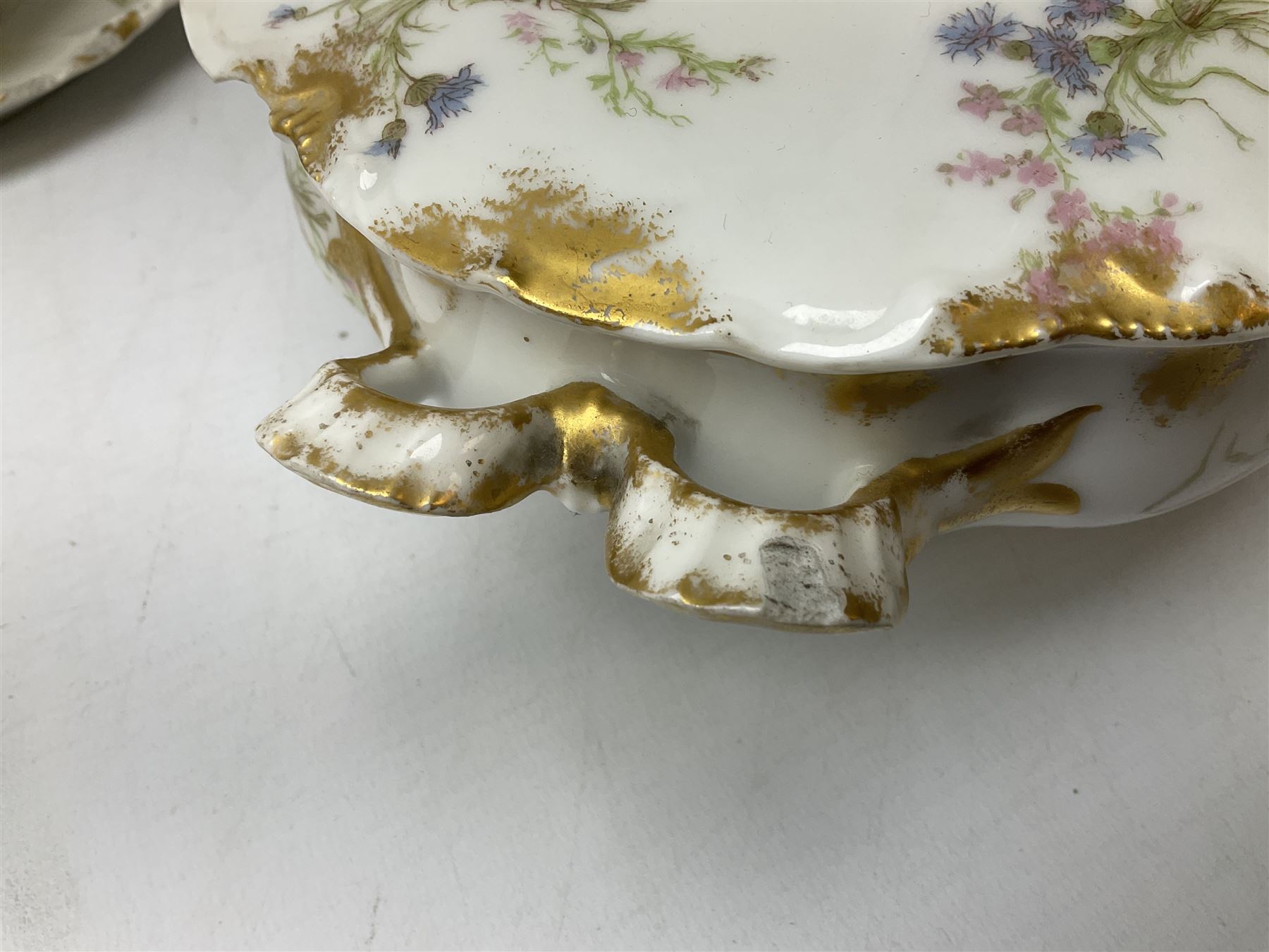 French Haviland Limoges part dinner service, decorated with floral sprays and gilding, to include two lidded tureens, thirteen plates, oval serving platter, etc, all stamped H & Co Made in France for James Green & Nephew (17) 