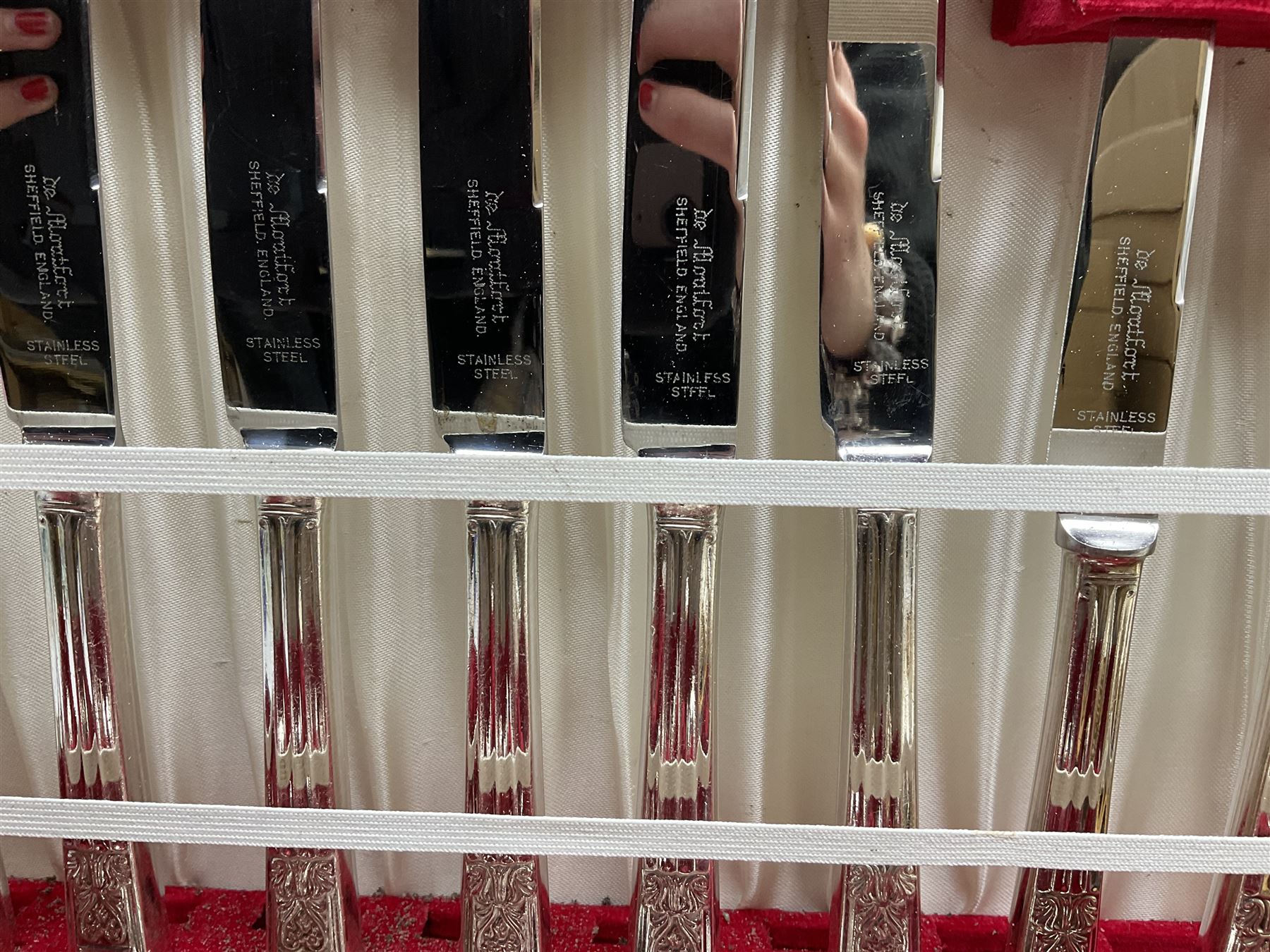 De Montfort cased canteen of silver plated cutlery for six place settings, together with further cased canteen of spoons and forks stamped Bon Marche