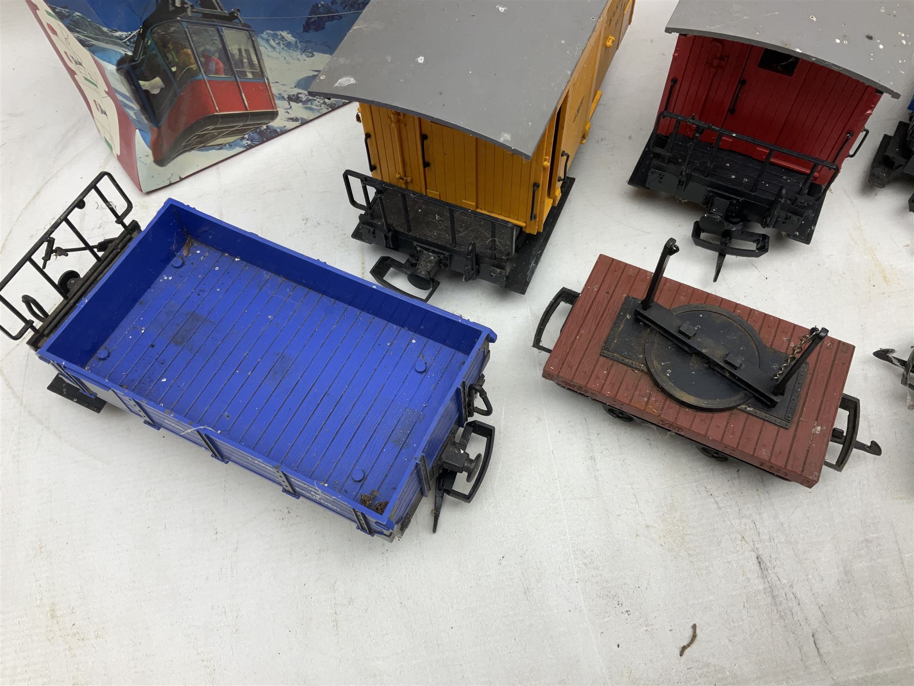 Three LGB (Lehmann Gross Bahn) G scale, gauge 1, rolling stock wagons, comprising two Lake George and Boulder wagons and an Auto Express wagon, together with a LGB passenger coach, other LGB rolling stock and a Lehmann Rigi900 ski lift