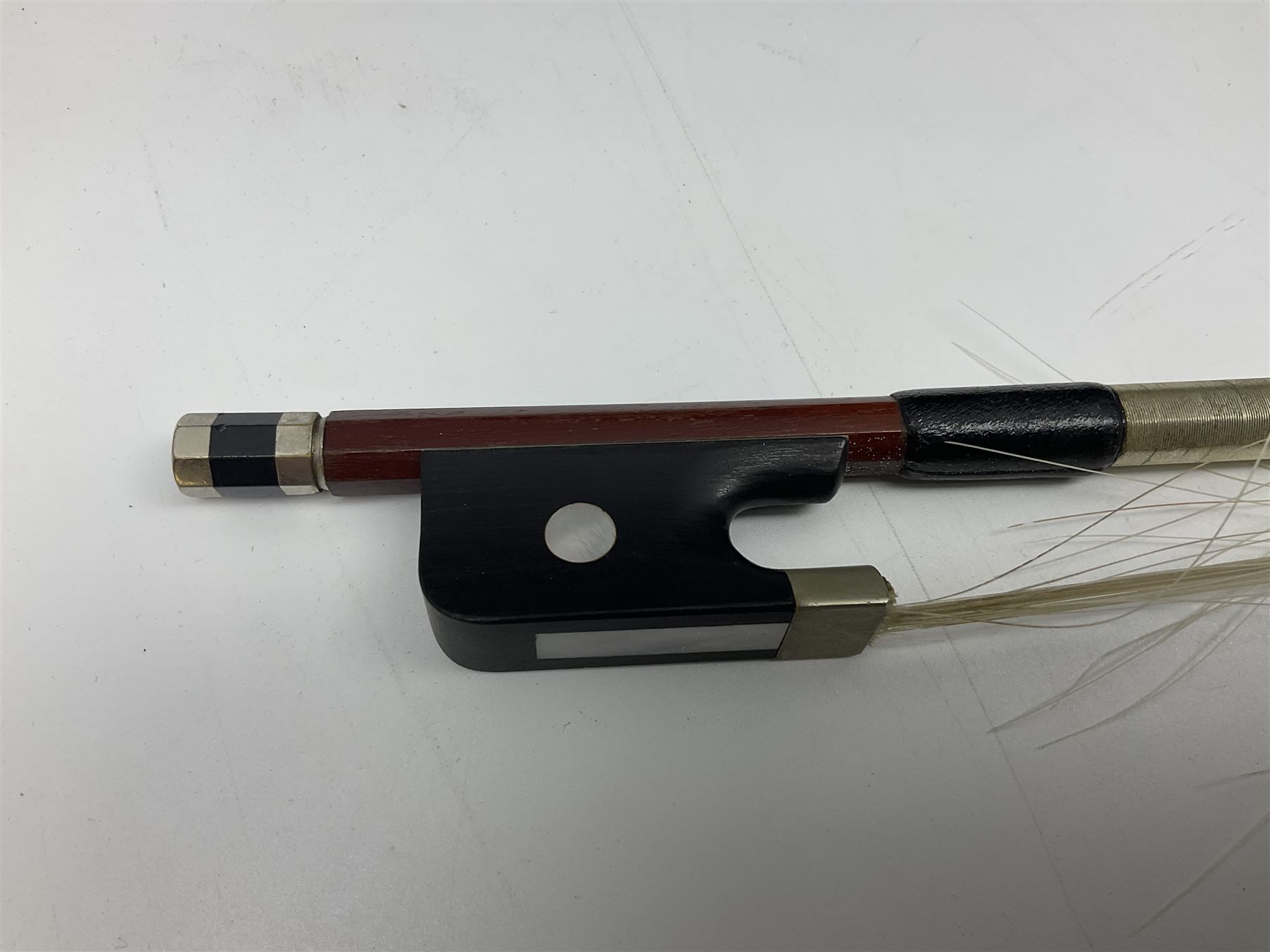 Modern Hungarian half-size cello with 69cm two-piece maple back and ribs and spruce top L114cm overall; and Stentor half size cello bearing label 'The Stentor Student II'; each in soft carrying case (2)