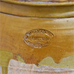Large Spanish terracotta olive jar, of typical baluster form with drip glaze decoration and three lug handles, with impressed mark fabrica de alfareria, H58cm