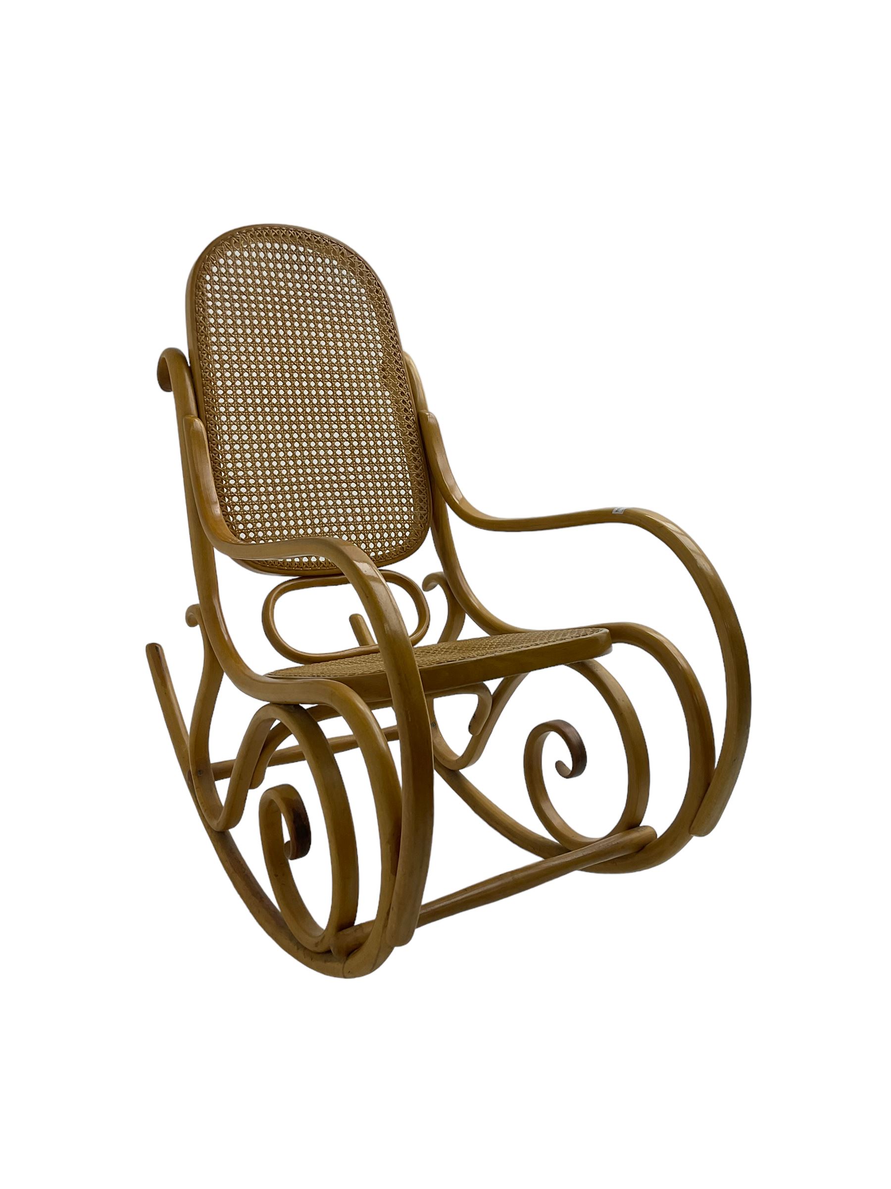 Early to mid-20th century Michael Thonet design bentwood rocking chair, with cane seat and back