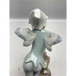 Lladro Privilege figure, Prince of Elves, modelled as an elf with wings leaning upon a rock, with original box, no 7690, sculpted by Joan Coderch, year issue 2001, year retired 2003, H23cm
