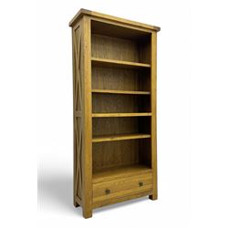 Oak Furnitureland, golden oak open bookcase fitted with single drawer