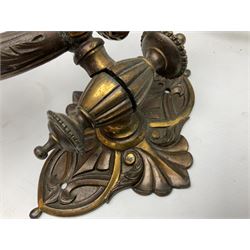 Victorian bronzed wall sconce, ornately decorated with ram's heads fixings, brass Primus paraffin pressure stove in tin box, brass doorstop modelled as a Scottish soldier, brass ashtrays, two wood boxes