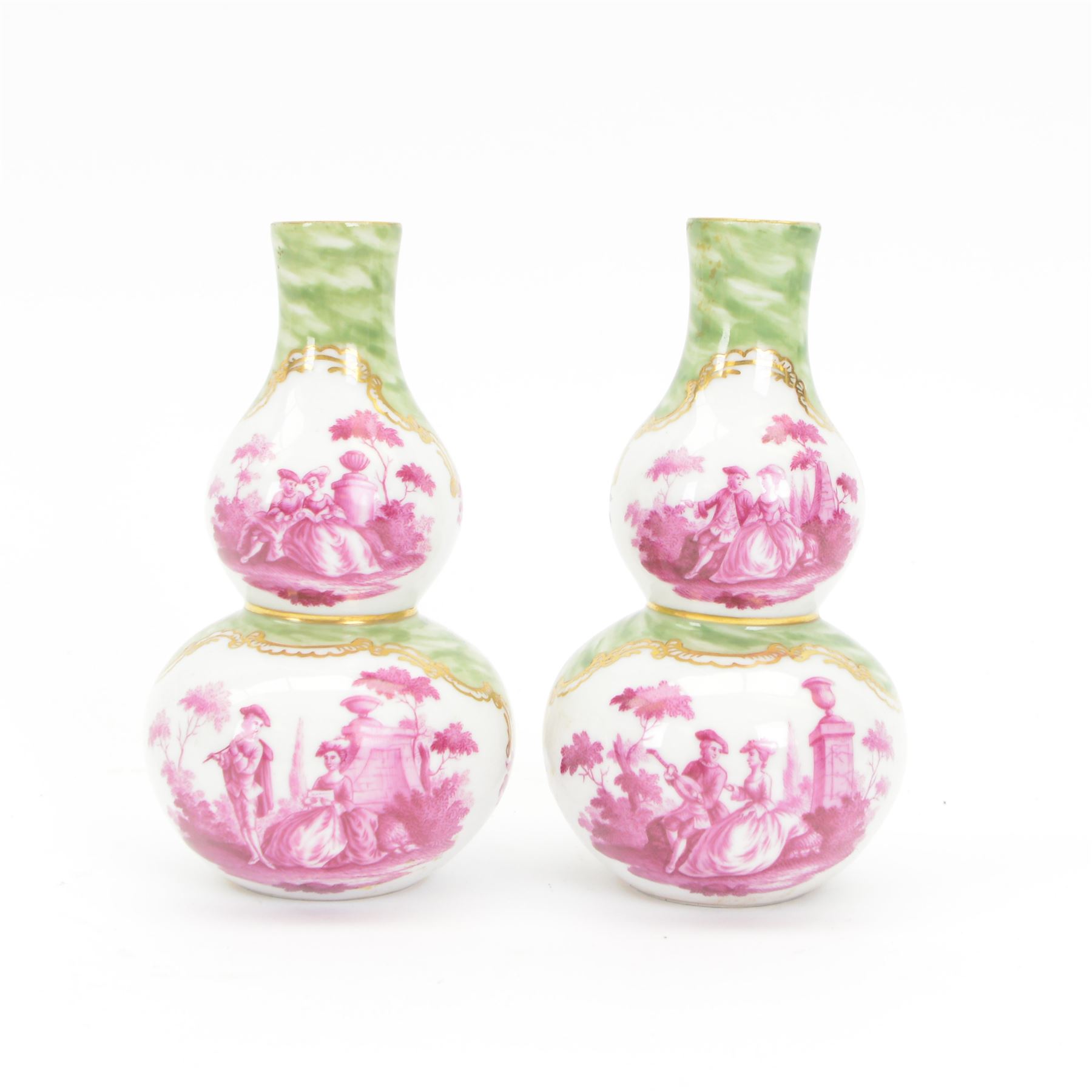 Pair of small late 19th century German double gourd vases, probably Dresden, each hand painted in puce with reserves of a courting couple within a garden setting, and floral sprays upon a white ground, within a green painterly surround, each with very faint traces of blue marks to the unglazed base, H12.5cm