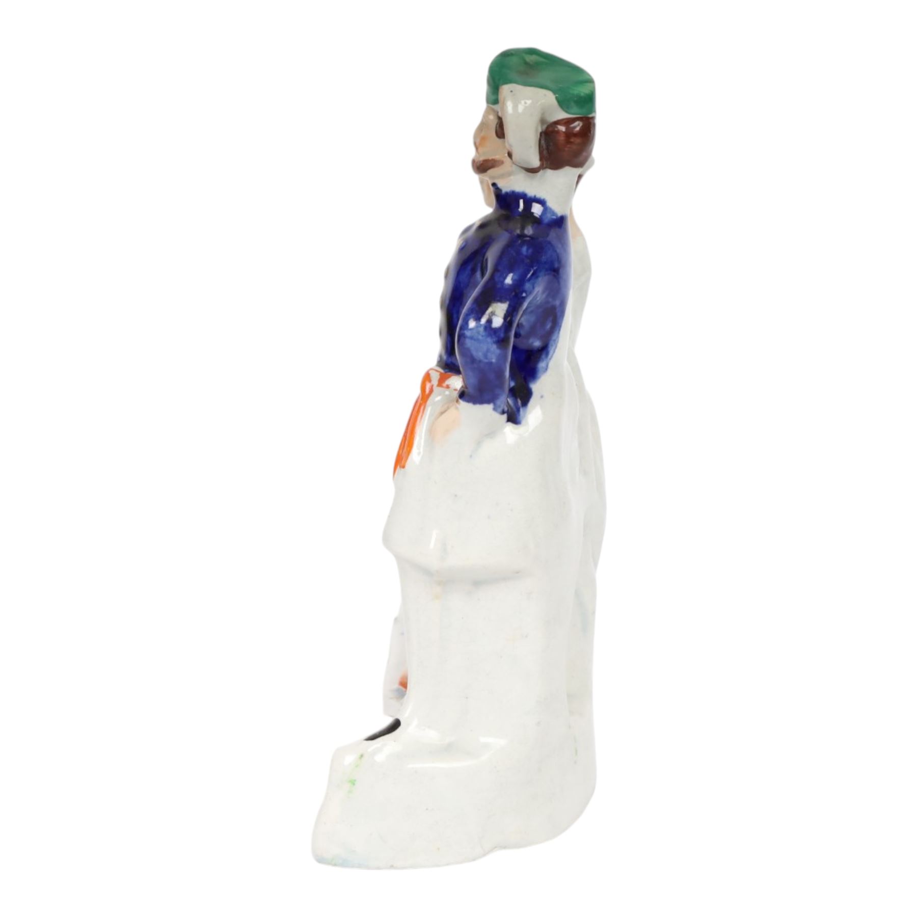 Rare mid 19th century Staffordshire figure group, Napoleon III, Victoria and Abdul-Medjid, made to commemorate the alliance of the three nations in the Crimean War, Victoria stands central with Napoleon in military uniform to her right, and the Sultan to her left, upon a titled base, H23.5cm