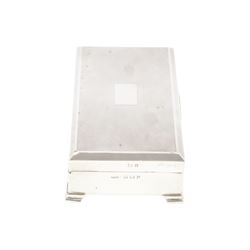 Mid 20th century silver mounted cigarette box, of rectangular form with engine turned decoration to the hinged cover, with vacant rectangular cartouche, opening to reveal a compartmentalised softwood interior, upon four bracket feet, hallmarked Henry Clifford Davis, Birmingham 1964, H4cm, W15cm