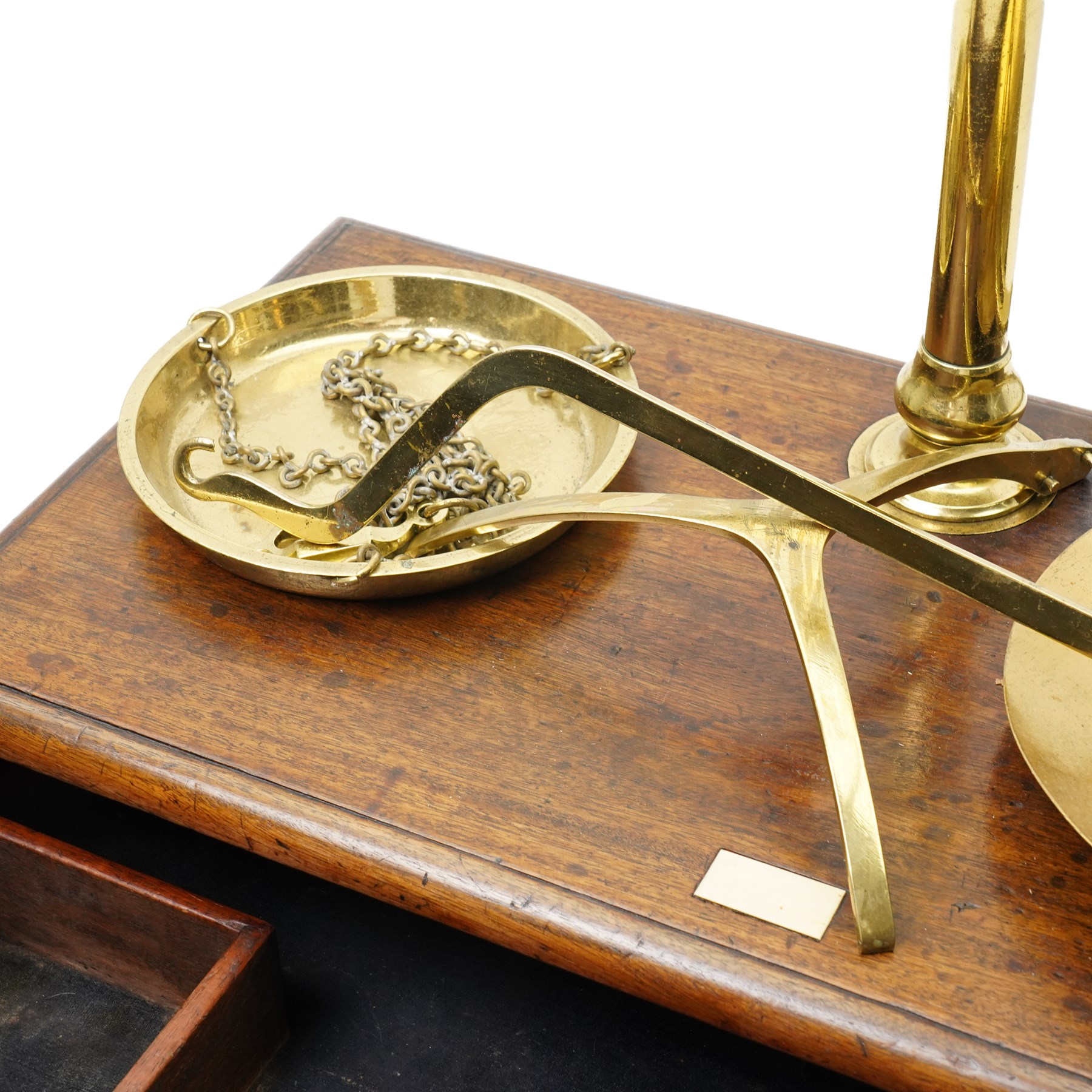  Large set of 19th century brass Apothecary Scales on mahogany single drawer base W56cm and a pair of 19C turned wood altar candlesticks