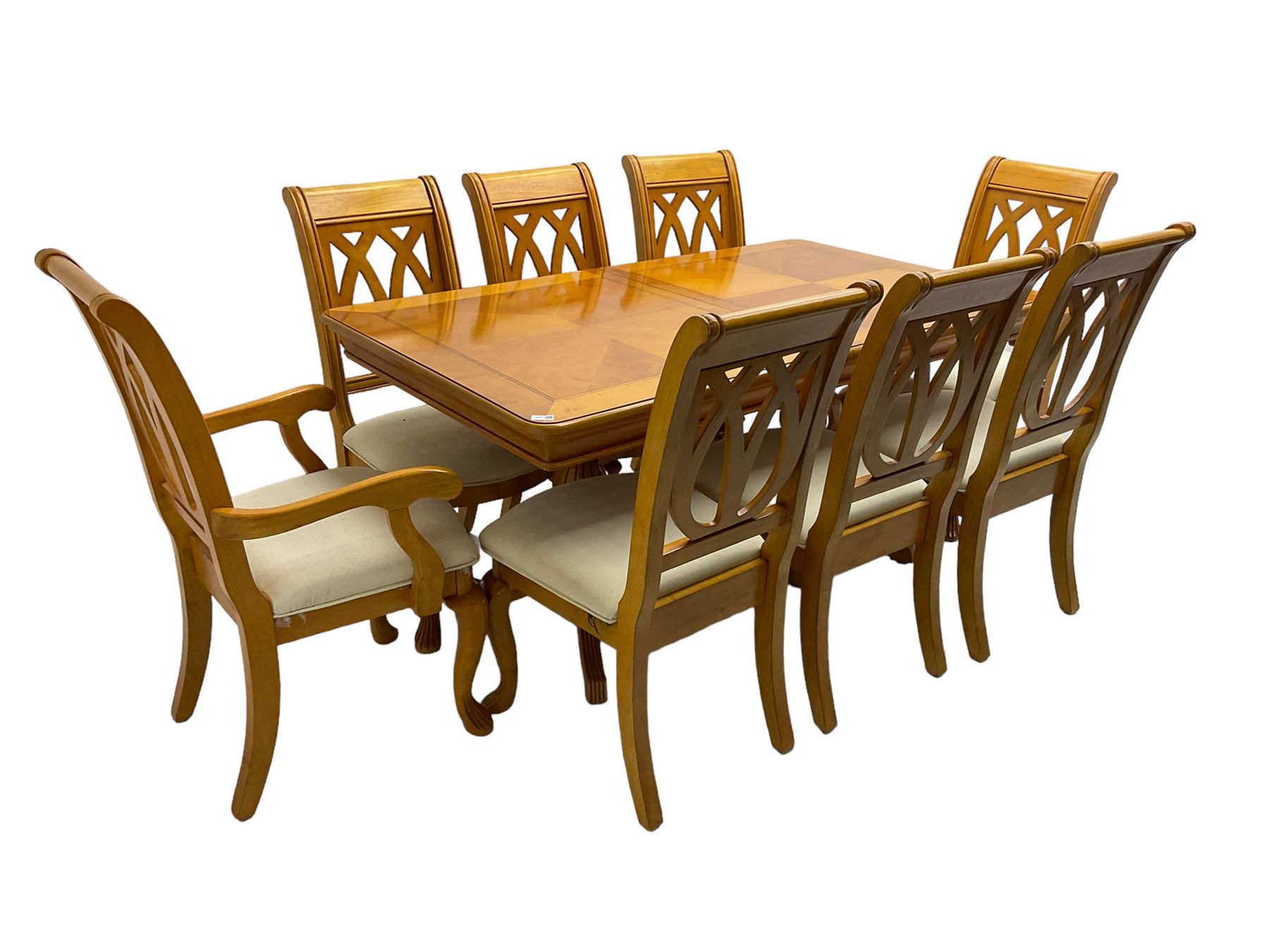 Yew wood extending twin pedestal dining table, rectangular top with ebony stringing over turned and reeded vasiform pedestals on tripod bases, with two additional leaves (W159cm D92cm); and set of eight (6+2) matching dining chairs, high pierced backs over seats upholstered in ivory fabric, on cabriole supports (W57cm H101cm)