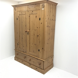 Solid pine double wardrobe, projecting cornice, two doors above two drawers, plinth base, W145cm, H189cm, D56cm