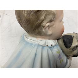 Royal Dux porcelain figure of shepherd boy and his dog with impressed number 2261, with applied pink triangular mark beneath, together with a piano baby holding a pug, shepherd H25cm
