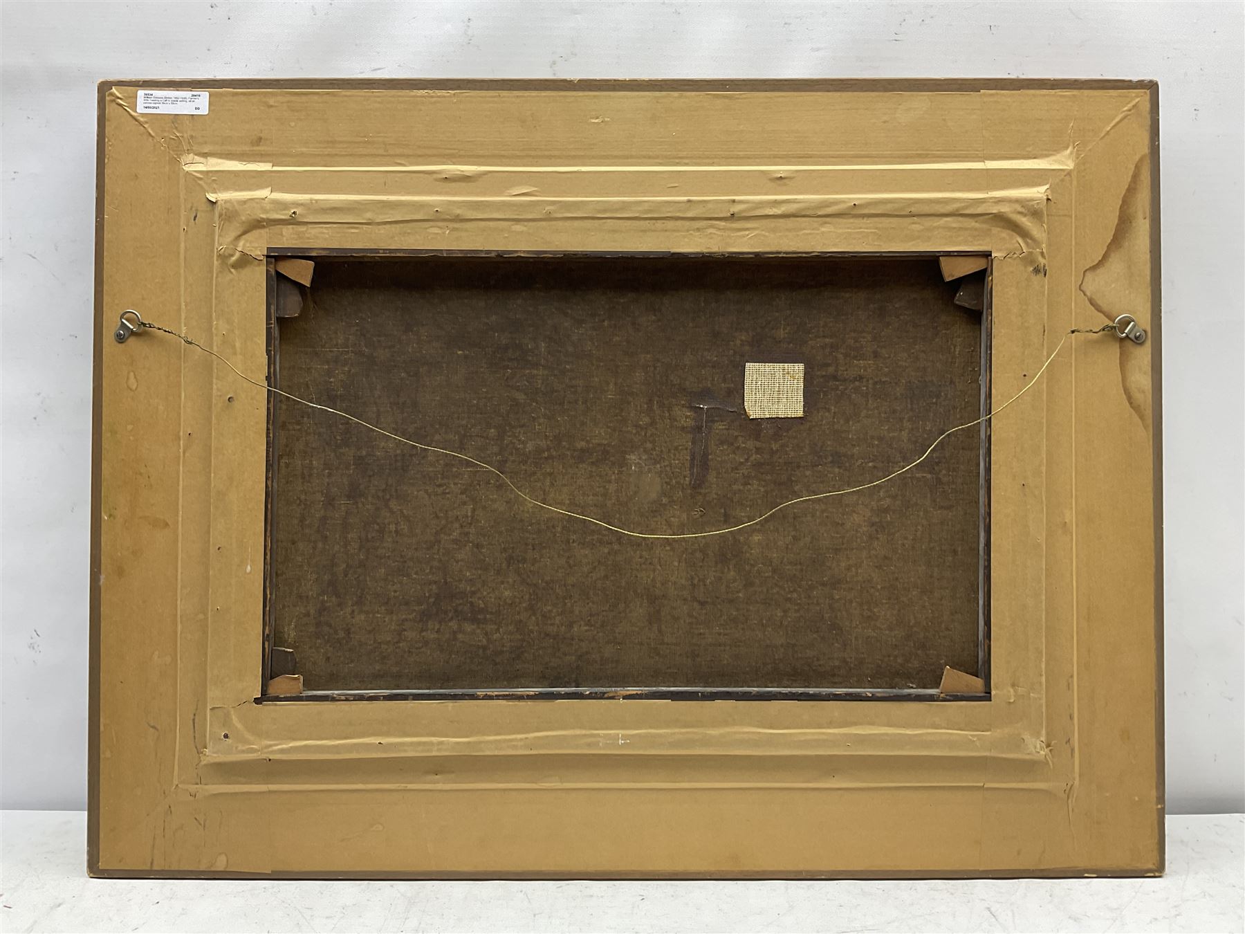 William Greaves (British 1852-1938): Farmer's Wife Feeding a Calf in Stable setting, oil on canvas signed 39cm x 59cm