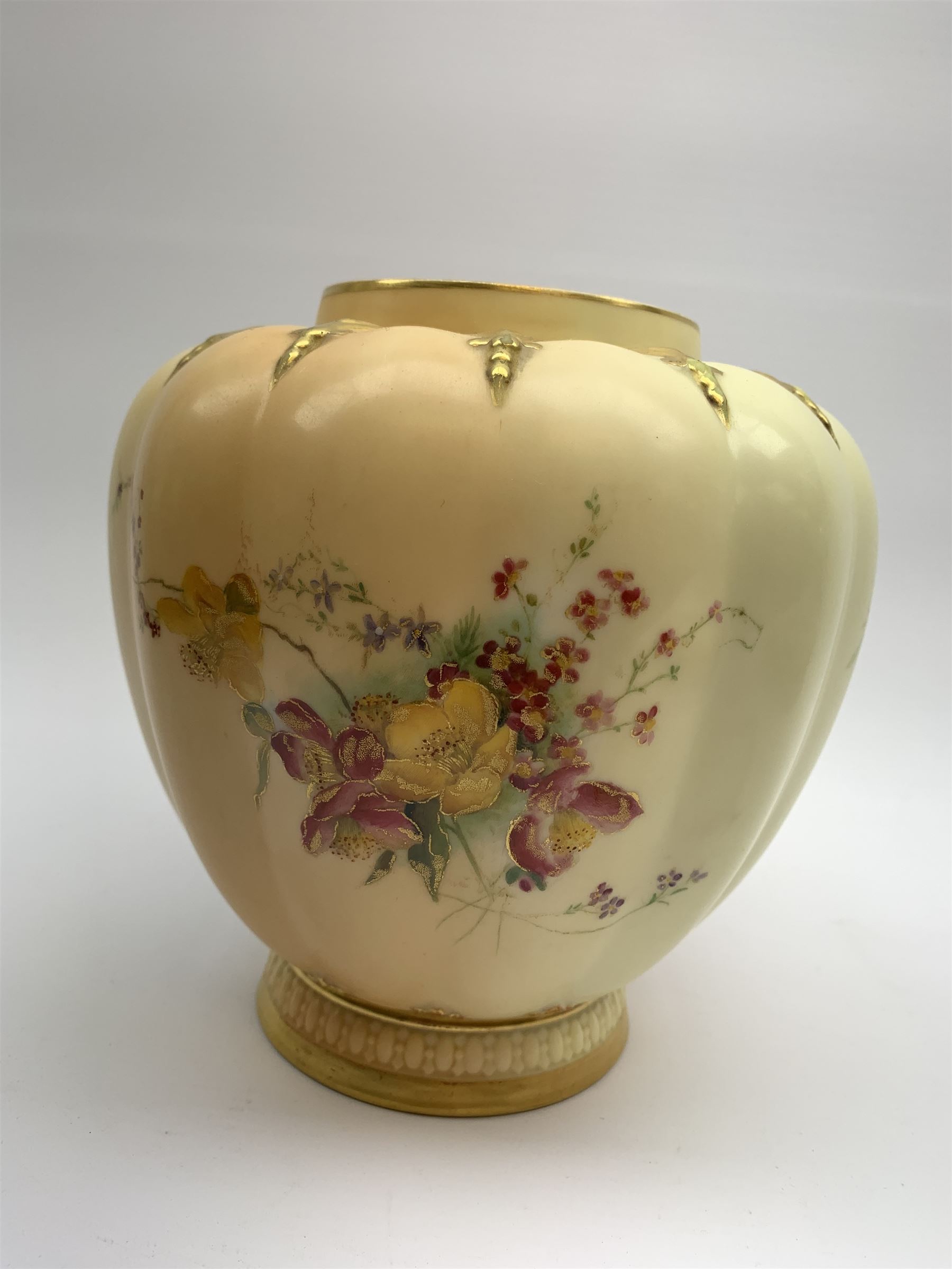 A Royal Worcester blush ivory potpourri jar and cover, of lobed form decorated with floral sprays and heightened with gilt, with printed marks beneath, RdNo112589, shape 1312, overall H19.5cm.