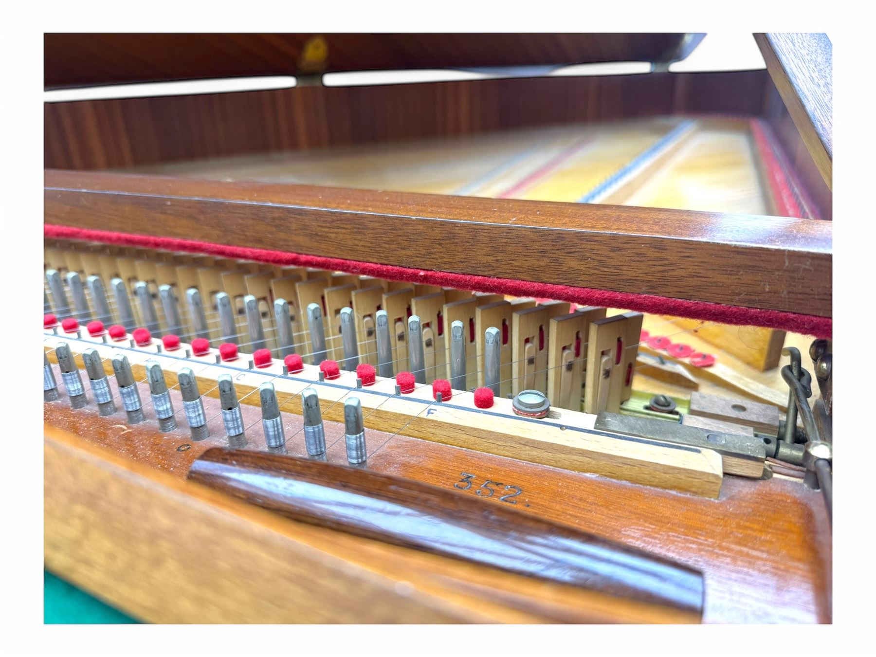 William de Blaise of London- mid 20th century Cembalo Traverso one manual Harpsichord in a teak case, with a five octave F1-f3 compass, two sets of strings and two rows of jacks, with three pedals and one hand stop, with one 8' and one 4', harp and piano to to 8', with a folding music desk and key fall, tuning key and tuning fork.
