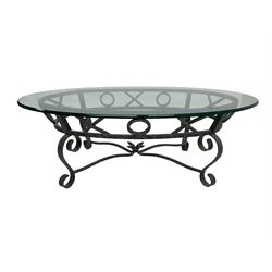 Wrought metal and glass top oval coffee table