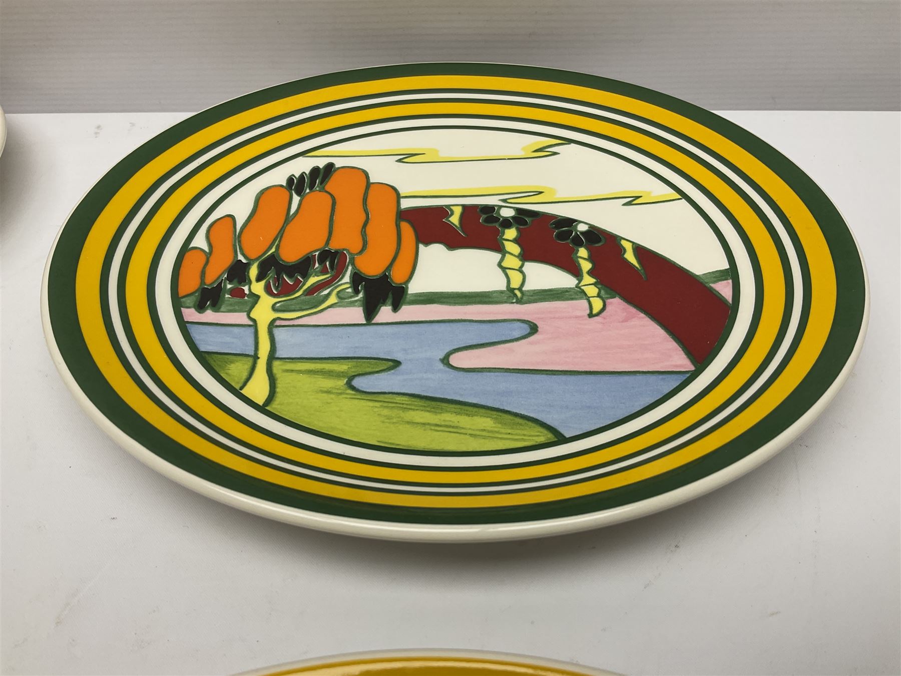 Four Clarice Cliff Wedgwood limited edition plates, comprising Orange Erin, Blue Firs, Solitude and May Avenue, all with certificate and box, D26cm