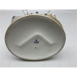 Lladro figure, The Loaves and Fishes, modelled as Jesus Christ with arms raised standing beside a basket of loaves and a basket of fish, sculpted by Salvador Furió, with original box, no 5896, year issued 1992, year retired 1997, H35cm