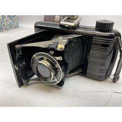 Bilora Boy Box Camera, with leather case, together with Zeiss Ikonta folding camera and another similar example 