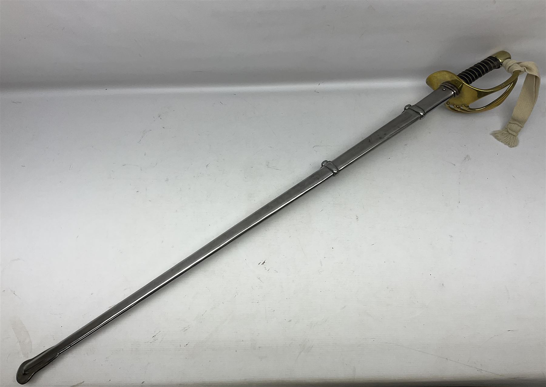 Early 19c French 1st Empire Heavy Cavalry trooper's sword, the 95.5cm double fullered blade with various stamped marks and inscribed Klingenthal 1814 to the back edge, four-bar brass hilt with wire-bound leather grip, knucklebow numbered 139; in polished steel scabbard with two suspension rings L117cm overall