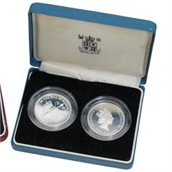 Eight The Royal Mint United Kingdom silver proof coins, comprising 1980 crown (2), 1981 crown (3), 1983 one pound, 1989 two pound two coin set, 2003 one pound, mostly cased with certificates, together with two Isle of Man 1977 silver proof crown coins issued by the Pobjoy Mint
