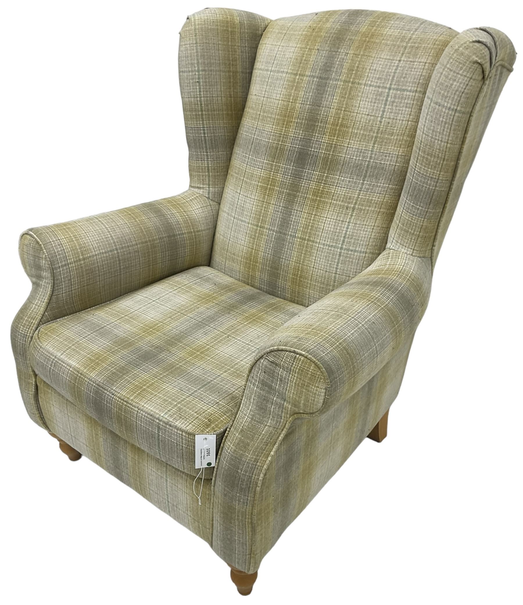 Next Home - 'Sherlock' hardwood framed wingback armchair, upholstered in pale green checkered fabric, on turned front feet