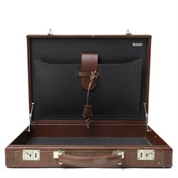 Fendi structured briefcase, brown FF monogram embossed leather with linear texture and single rolled leather top handle, silver-tone hardware, the hinged frame secured by two central push-lock clasps and supplied with two keys stamped CGV, the interior lined in black cross-grain leather with document compartments and metal plaque stamped FENDI S.A.S. ROMA MADE IN ITALY, W42cm D32cm H8cm