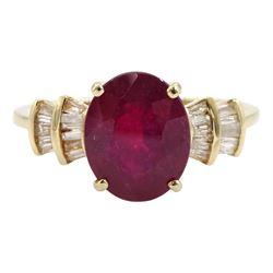 9ct gold oval ruby and baguette cut diamond ring, hallmarked 