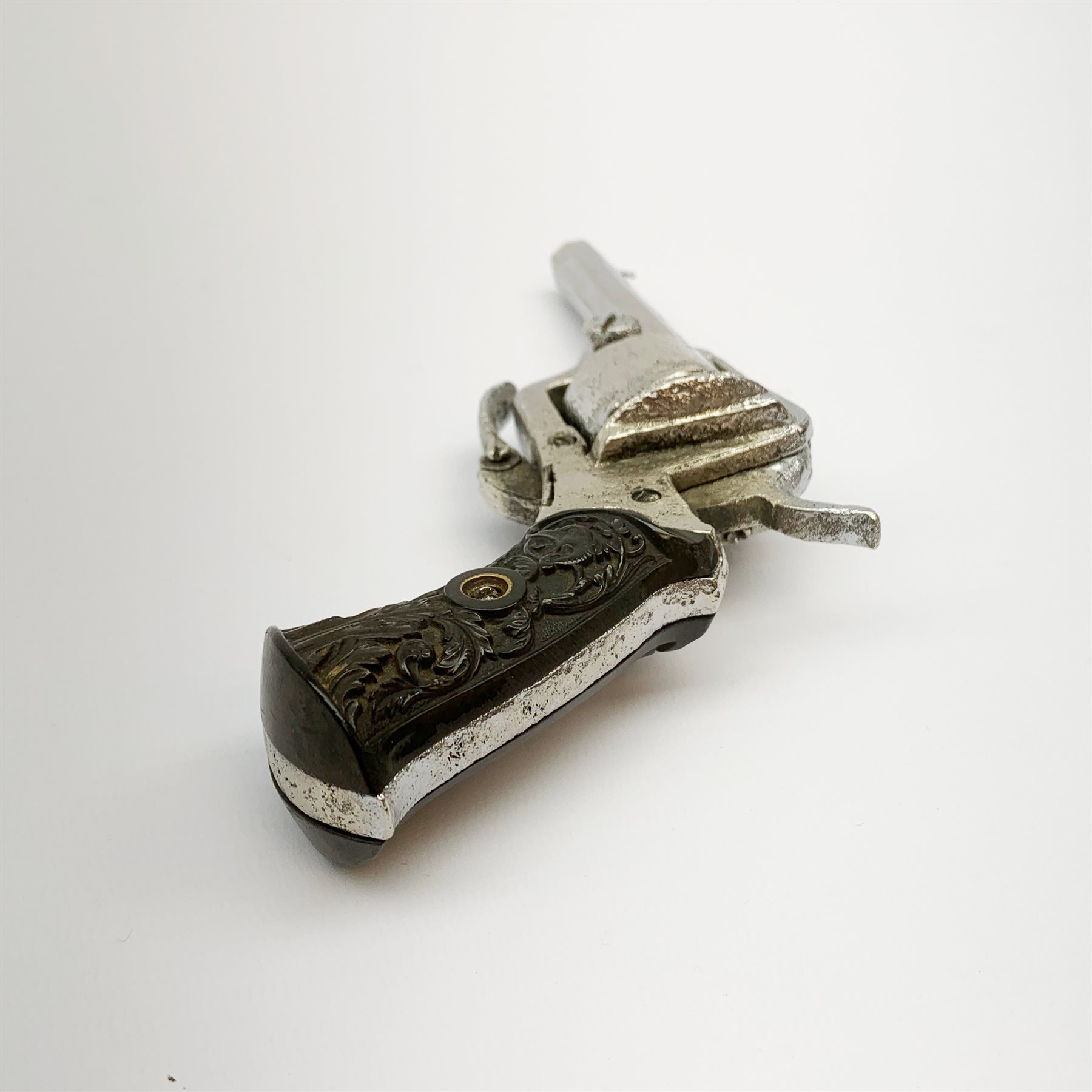 19th century plated Belgian 7mm pin-fire revolver, the six-shot cylinder inscribed 'The Young Lion 1881 New Pattern', with folding trigger and carved walnut split stock, barrel length 7.5cm, overall length 18.5cm