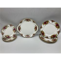 Royal Albert Country Roses pattern part tea and dinner service, to include teapot, four cups and saucers, four dessert plates, cake plate etc, (41)