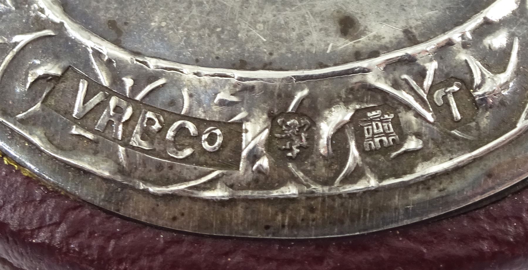 18ct white gold three stone oval ruby and round brilliant cut diamond ring, with diamond set shoulders, stamped, ruby approx 1.15 carat, total diamond weight approx 0.55 carat, in silver top ring box by The Victorian Ring Box Co, Edinburgh 1993 