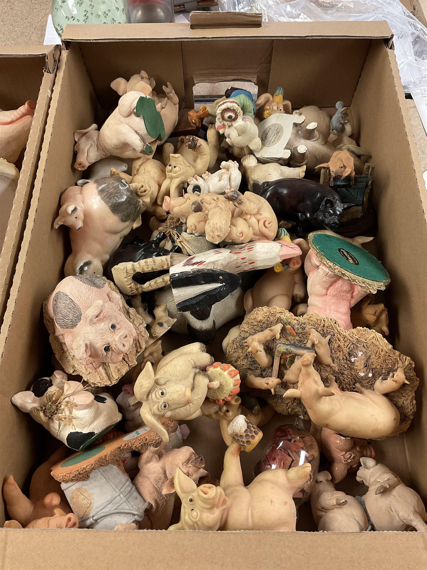 Collection of model pigs, Staffordshire Woodland Collection figures, trophies etc in three boxes